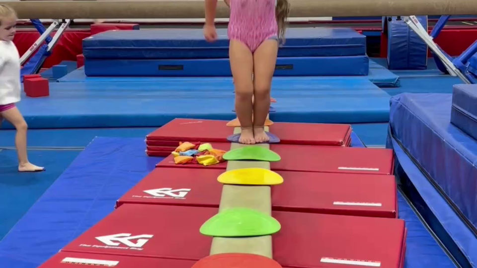 Building Confidence on Beam with our Tiny Tumblers